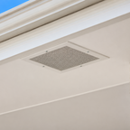 White Dragon Vents EV350PV passive eaves vent installed in a house eave for natural roof cavity ventilation.
